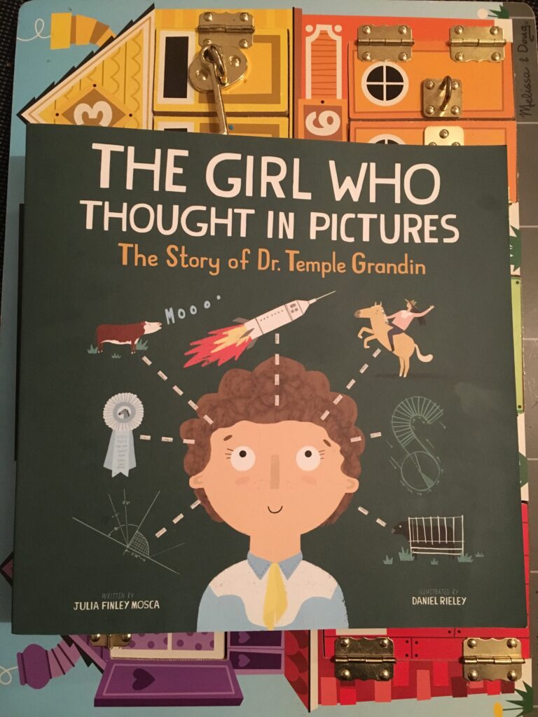 The girl who thought in pictures. The story of Dr. Temple Grandin written by Julia Finley Mosca and illustrated by Daniel Rieley.